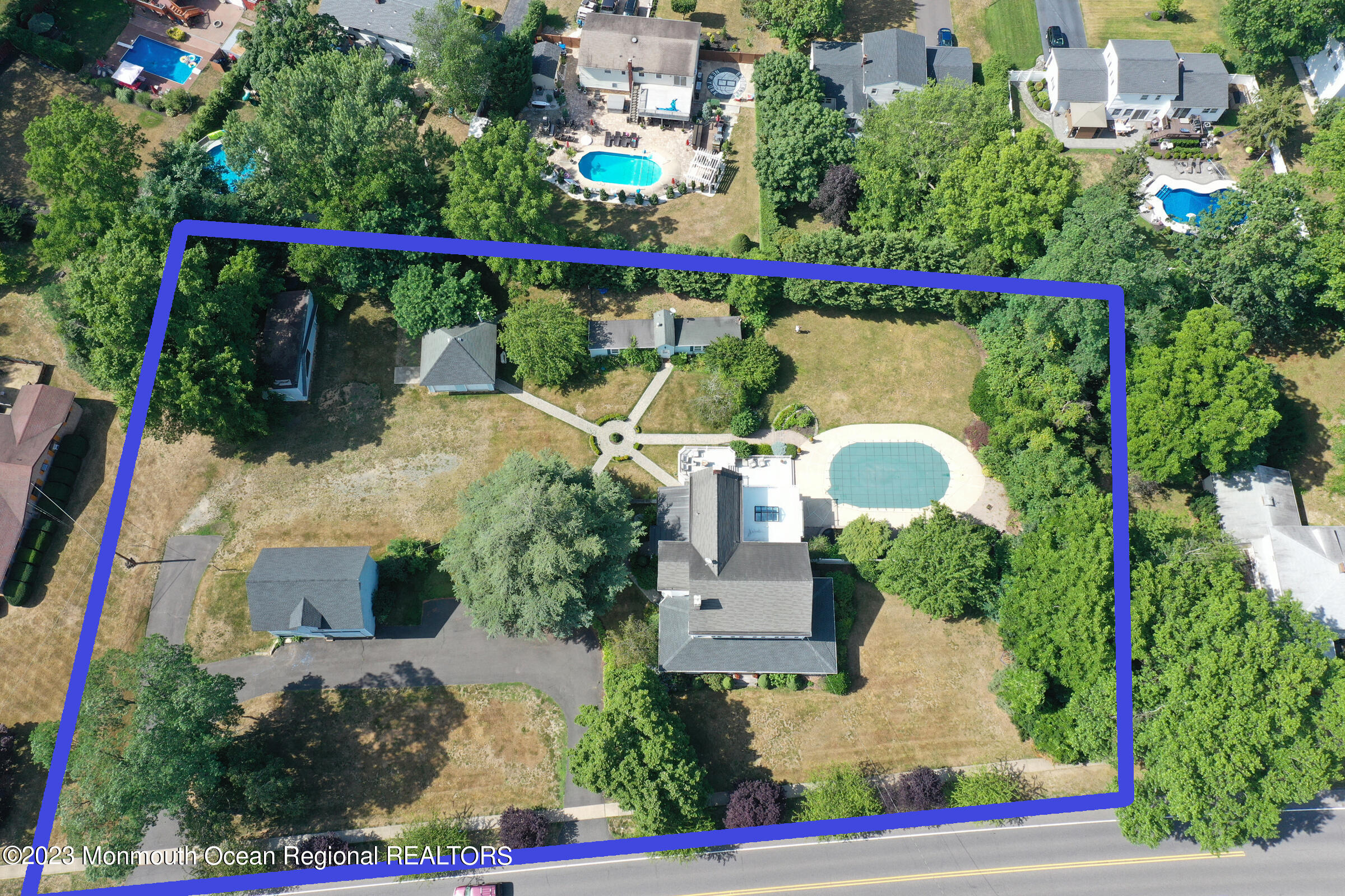 51 Cherry Tree Farm Road Middletown, NJ 07748 - Photo 4 of 62 an aerial view of a house with a yard and potted plants