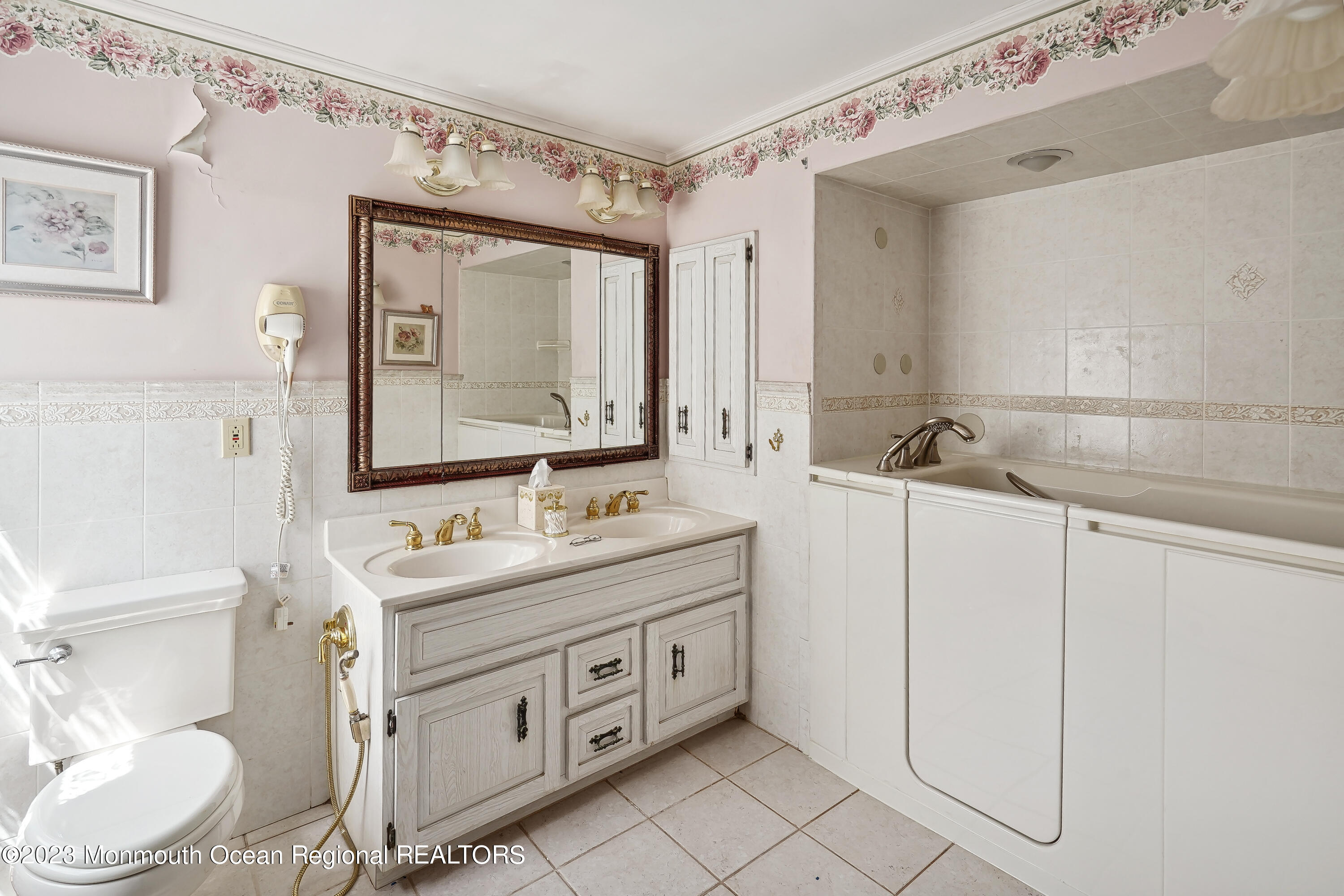 51 Cherry Tree Farm Road Middletown, NJ 07748 - Photo 46 of 62 a bathroom with a granite countertop sink mirror vanity and toilet
