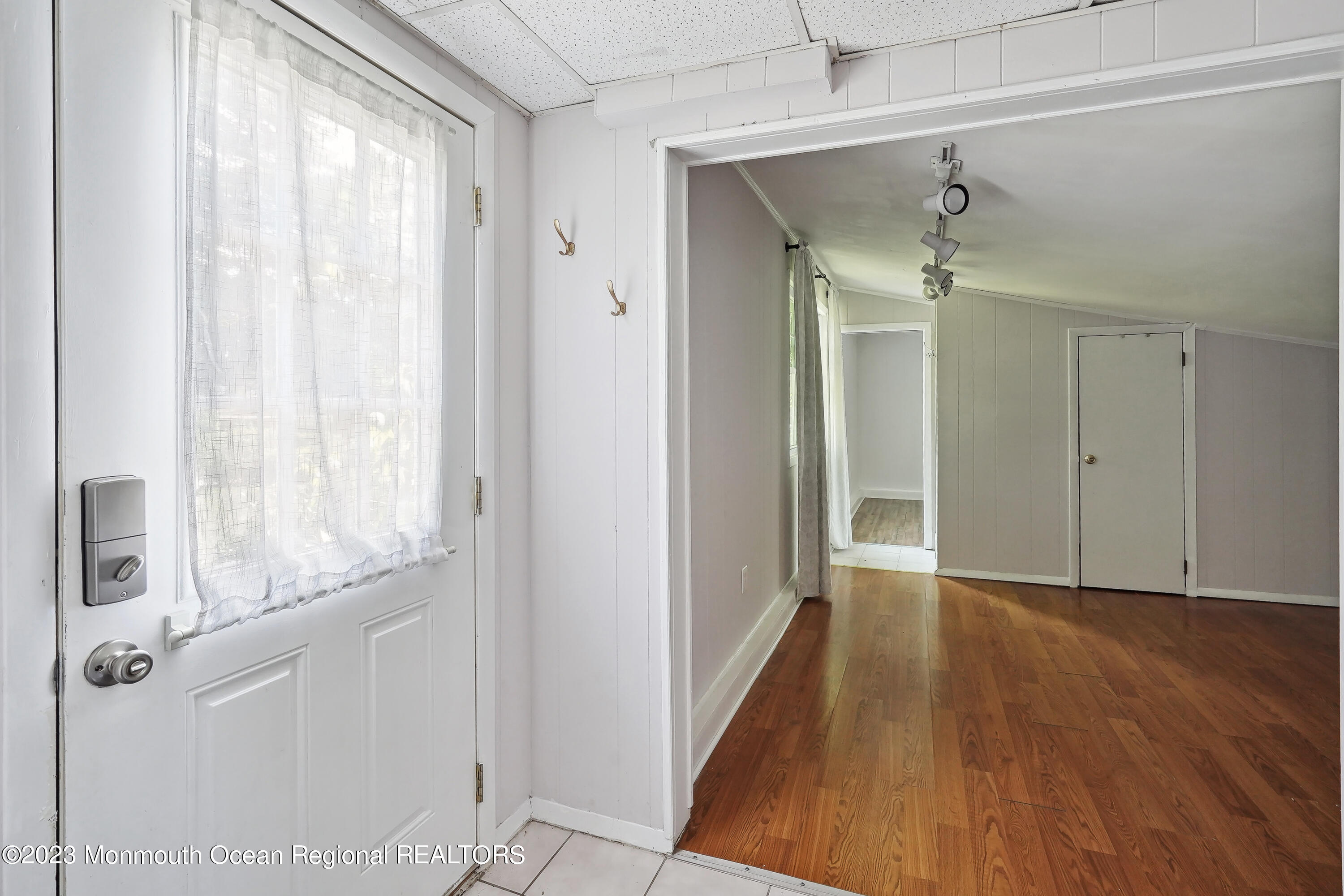 51 Cherry Tree Farm Road Middletown, NJ 07748 - Photo 52 of 62 a view of a hallway with wooden floor and closet area