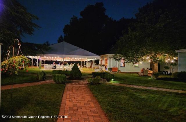 51 Cherry Tree Farm Road Middletown, NJ 07748 - Photo 54 of 62 a view of a house with a yard