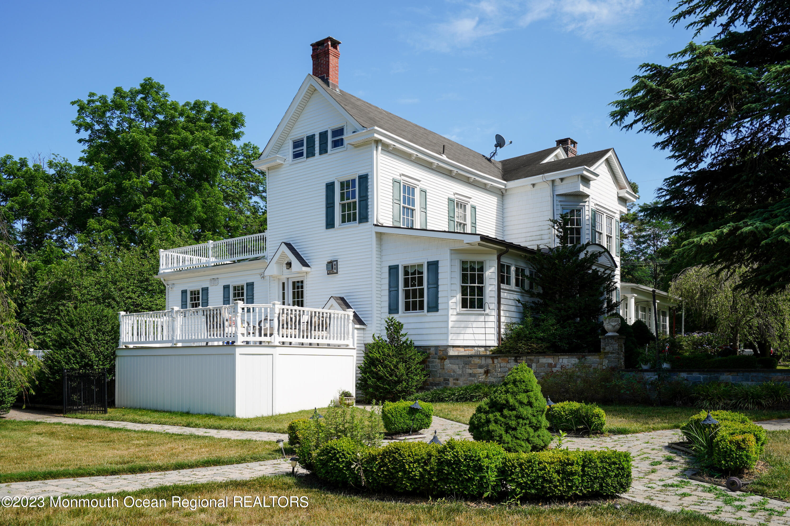 51 Cherry Tree Farm Road Middletown, NJ 07748 - Photo 55 of 62 a view of a house with a big yard plants and large trees