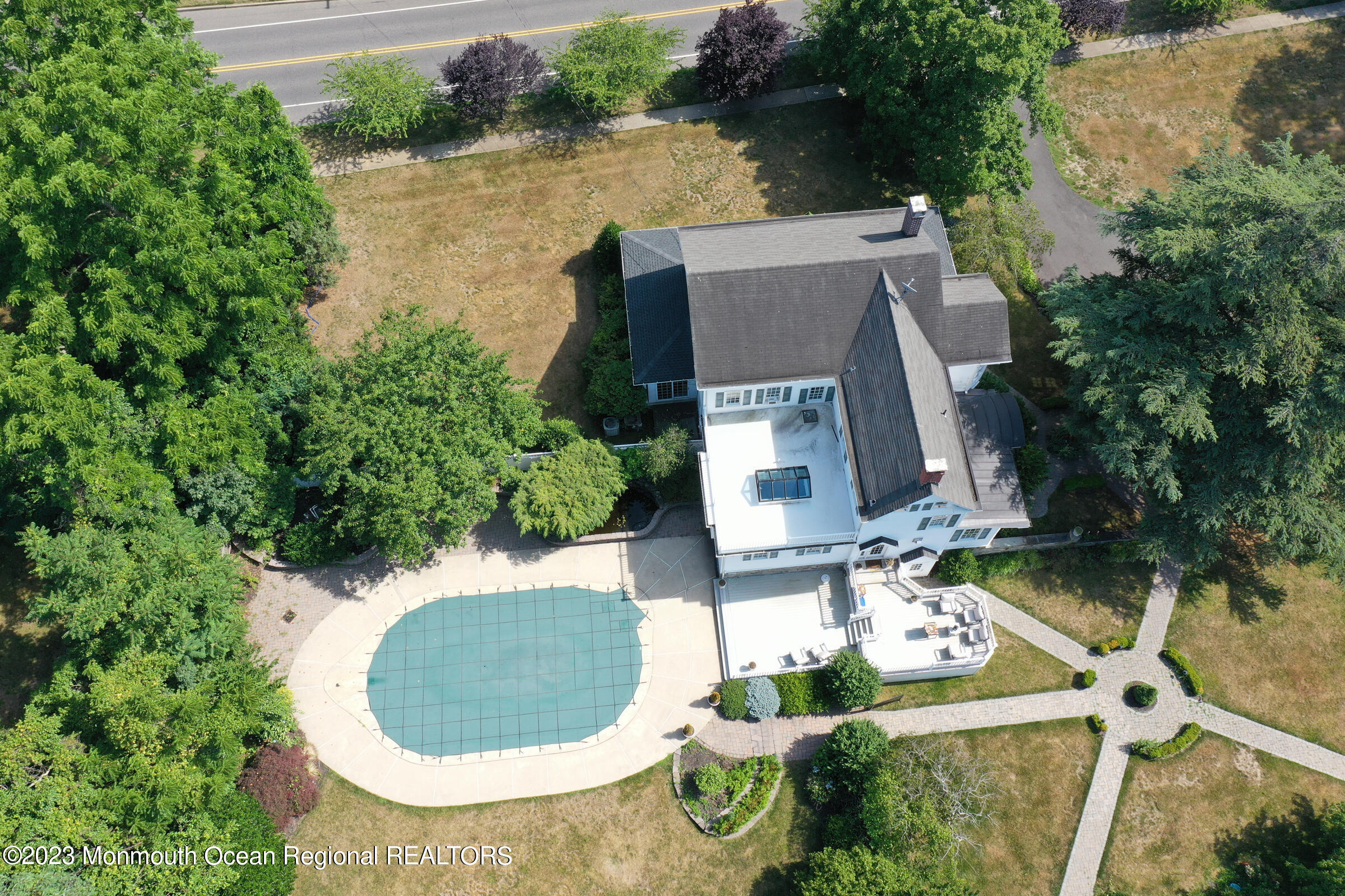 51 Cherry Tree Farm Road Middletown, NJ 07748 - Photo 10 of 62 an aerial view of a house with outdoor space and lake view