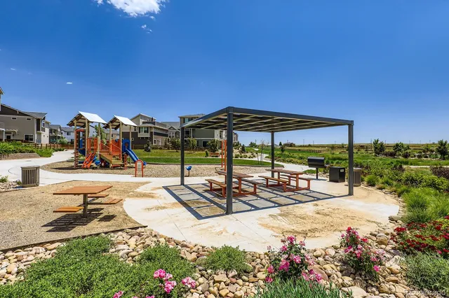 a view of a swimming pool with a patio