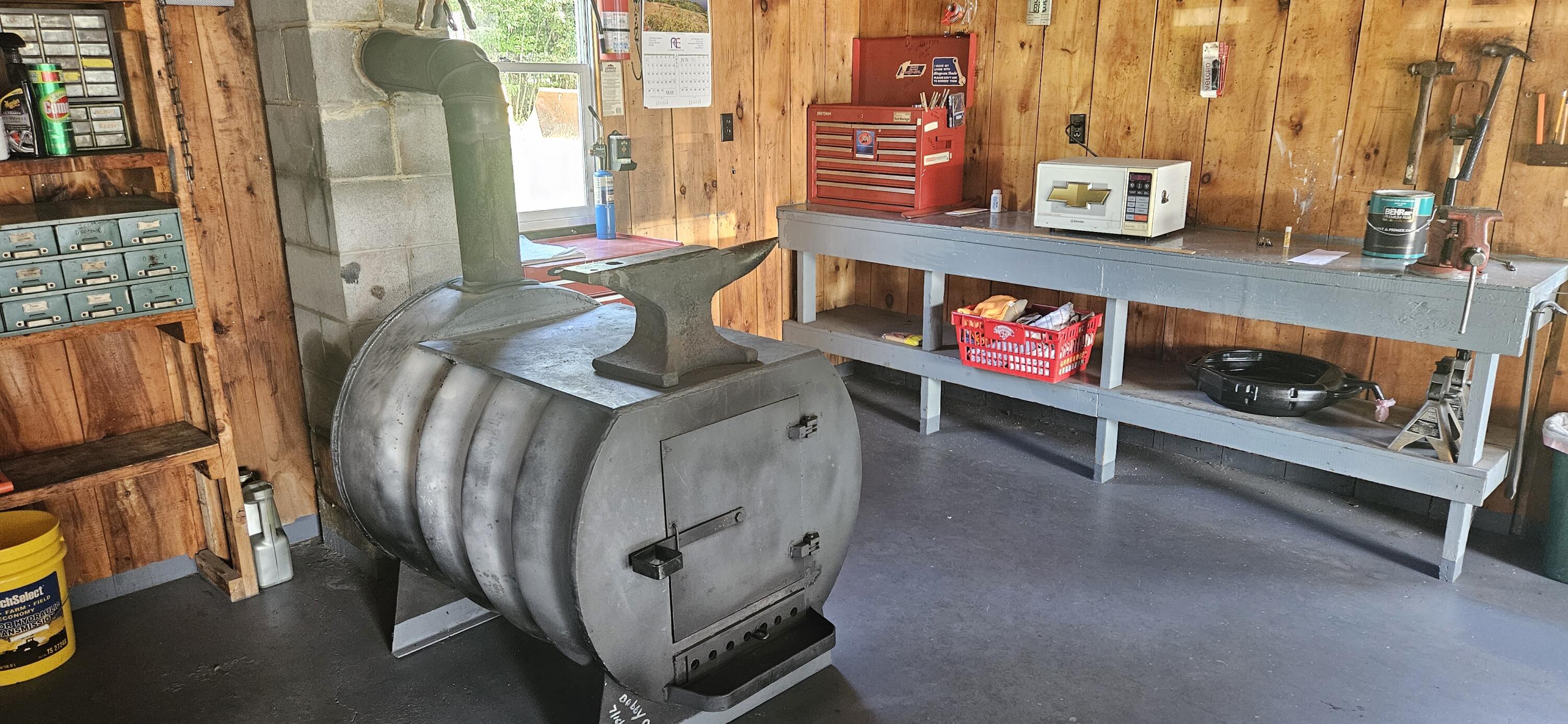 63 Water Street Howland, ME 04448 - Photo 32 of 35 Woodstove in Garage