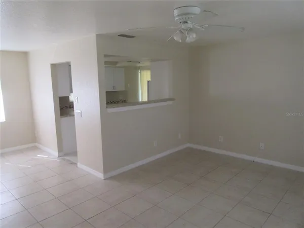 an empty room with a bathroom