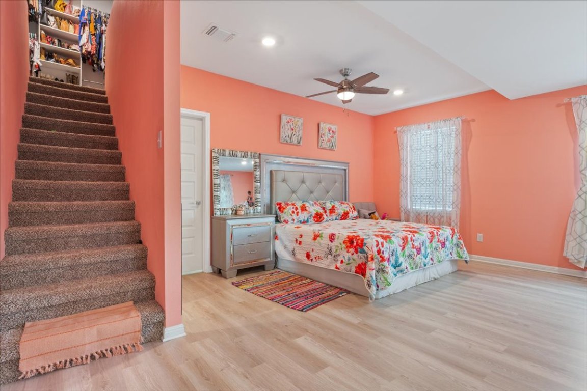 50 Dusty Dam Road Coupland, TX 78615 - Photo 16 of 38 This room provides privacy and comfort away from the main living areas. It’s an ideal place to unwind at the end of the day.