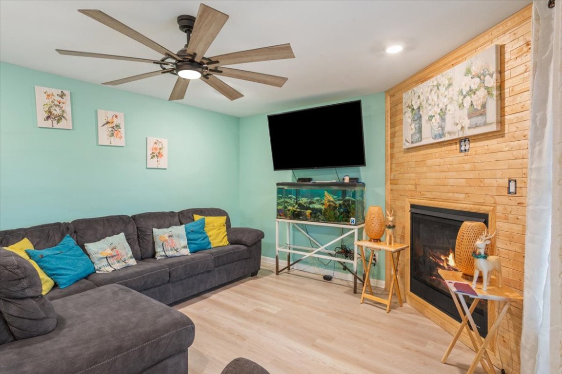 50 Dusty Dam Road Coupland, TX 78615 - Photo 7 of 38 The living room in the main home provides a comfortable and inviting space for everyday living.