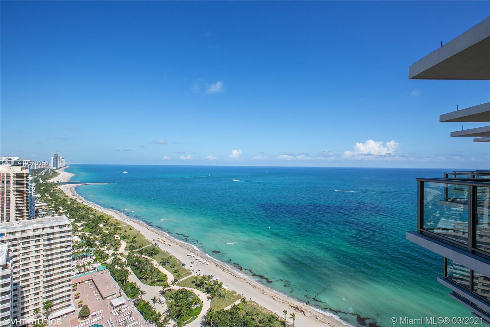9703 Collins Avenue, Unit PH07 Bal Harbour, FL 33154 - Photo 1 of 23 a view of an ocean from a balcony