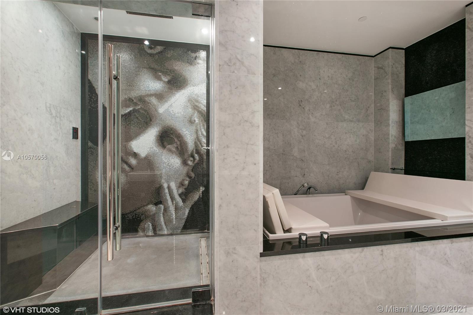 9703 Collins Avenue, Unit PH07 Bal Harbour, FL 33154 - Photo 11 of 23 a bathroom with a sink and a shower