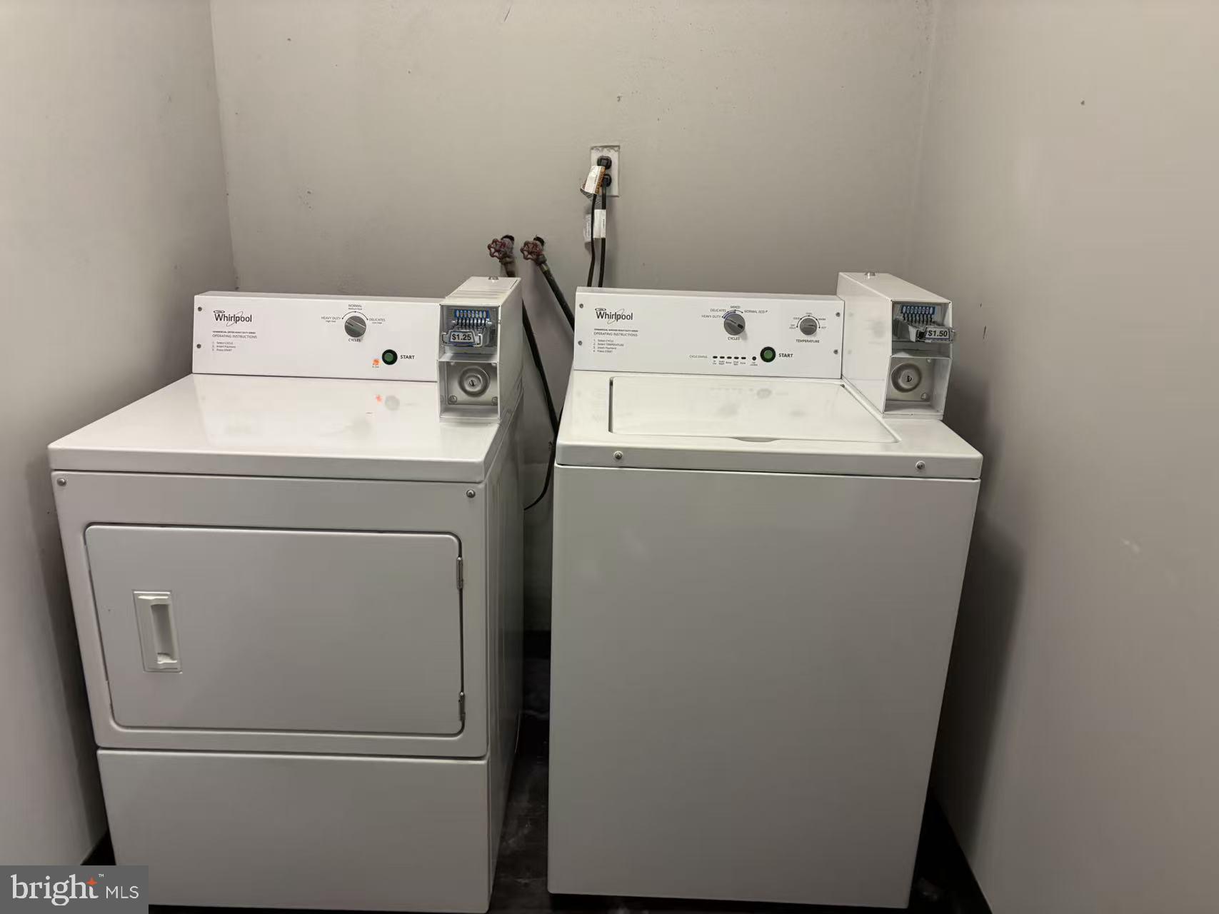1009 Arch Street, Unit 4B Philadelphia, PA 19107 - Photo 3 of 4 a utility room with dryer and washer