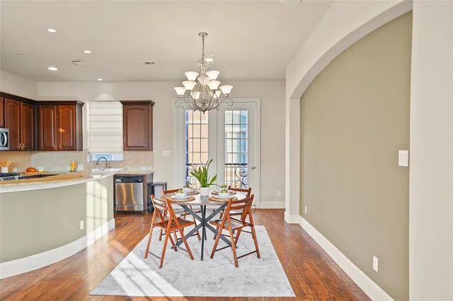 a view of a dining room with furniture and window