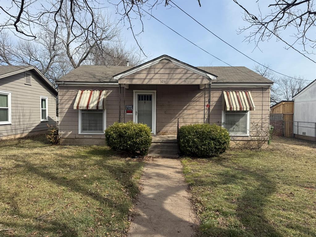 3211 North 25th Street Waco, TX 76708 - Photo 1 of 12 a view of a house with a yard