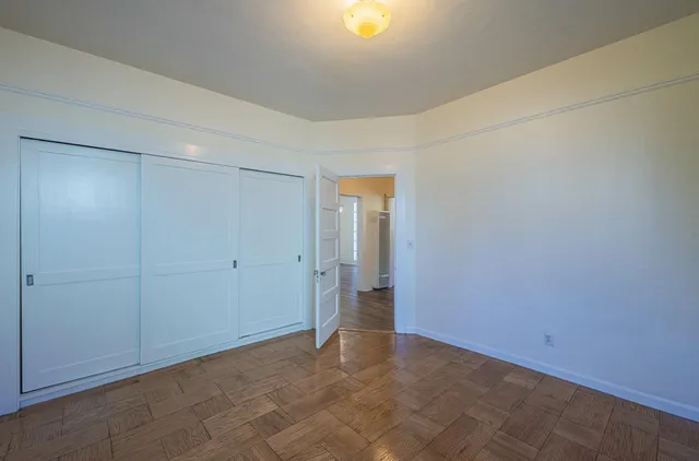 a view of an empty room and window