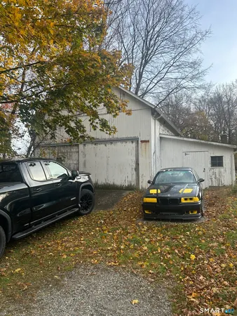 a car parked in front of a house