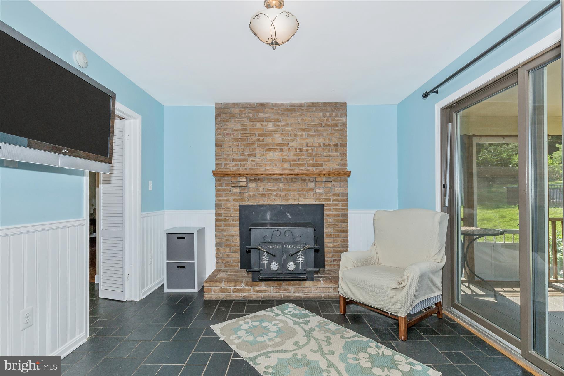 2511 Bidle Road Middletown, MD 21769 - Photo 8 of 29 Cozy hearth in breakfast room & mounted TV