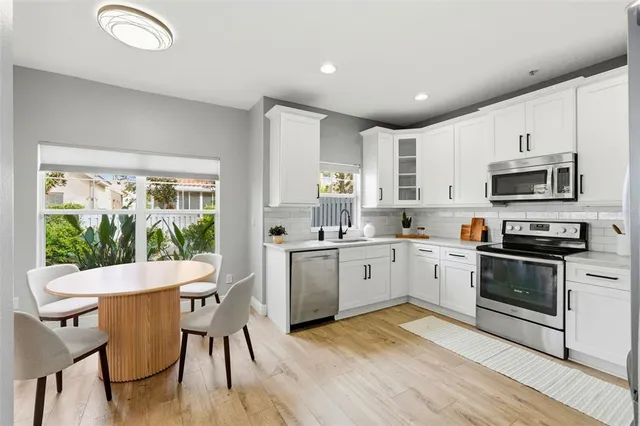 a view of a dining room with furniture window and outside view