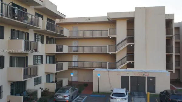 a front view of a building with glass windows