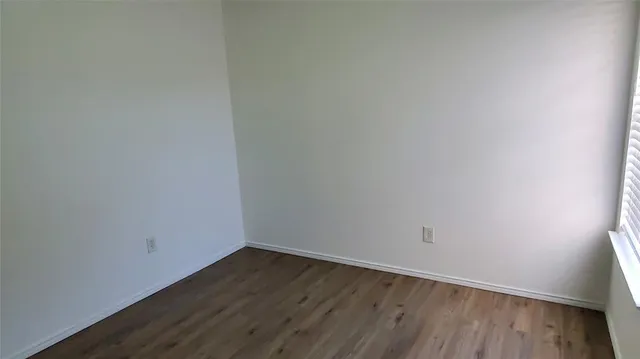 a bathroom with a sink and vanity