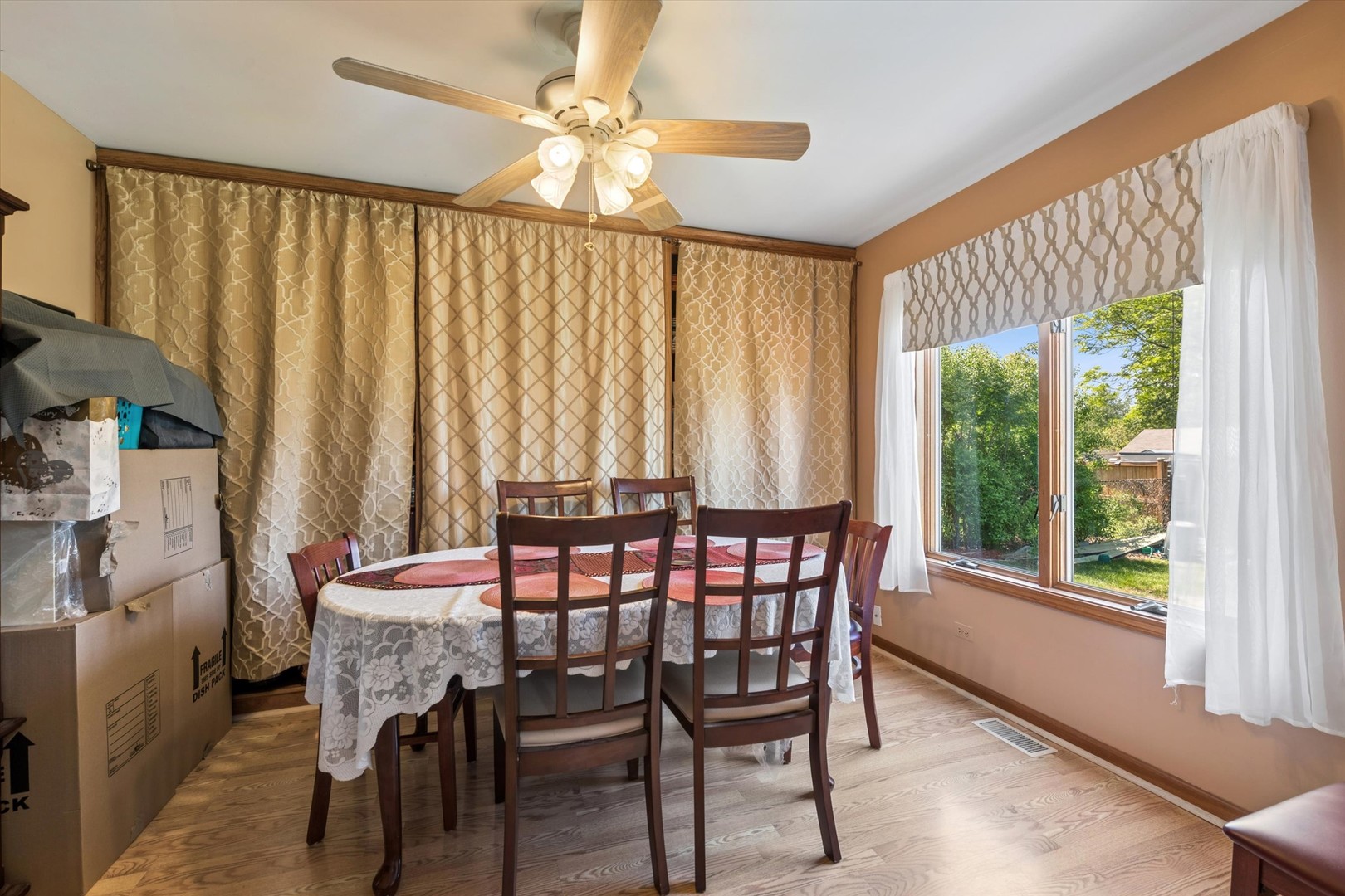 2142 North Summit Street Wheaton, IL 60187 - Photo 14 of 35 a view of a dining room with furniture window and outside view