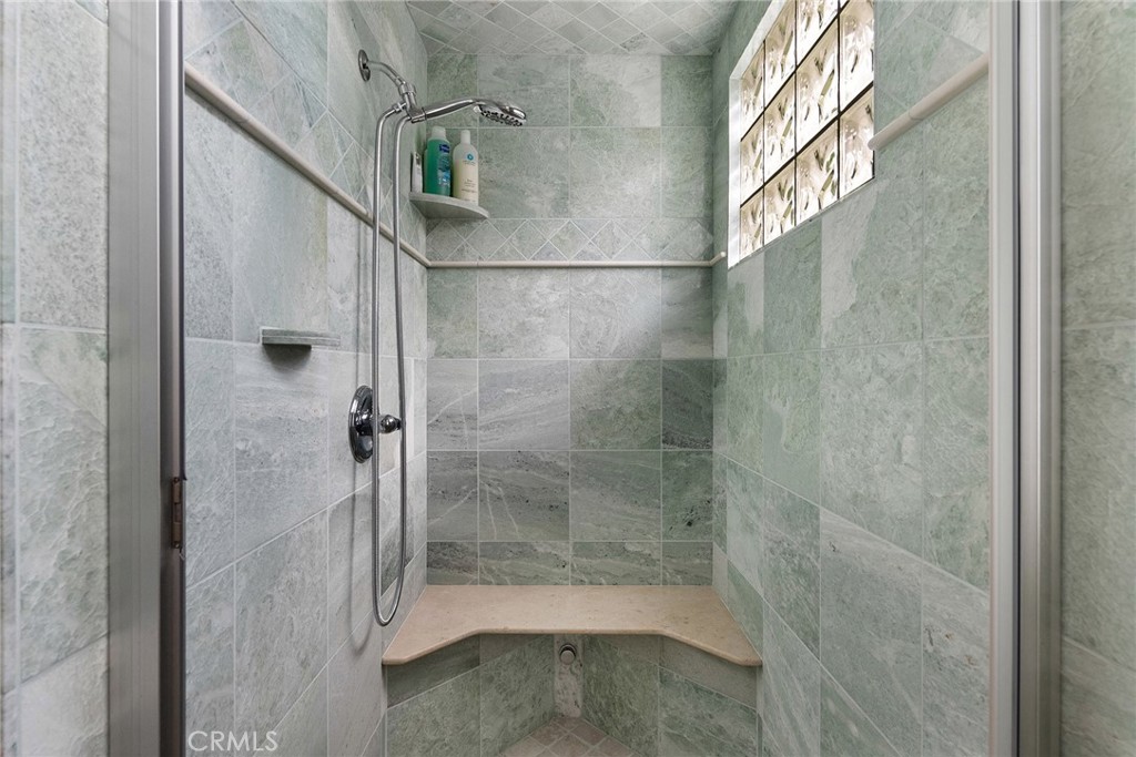 3171 Sandstone Lane Chico, CA 95928 - Photo 29 of 70 a bathroom with a glass shower door