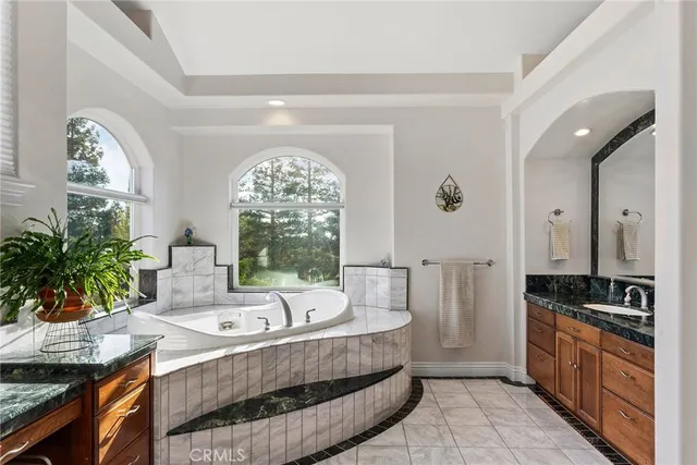 a view of a patio with a table and chairs