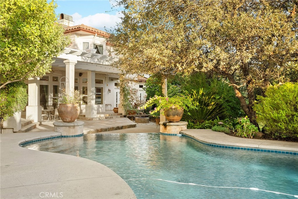 3171 Sandstone Lane Chico, CA 95928 - Photo 45 of 70 a view of a swimming pool with an outdoor space