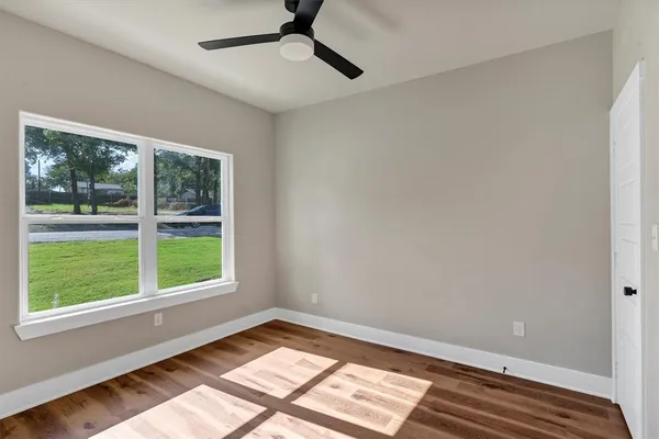 a view of an empty room and window