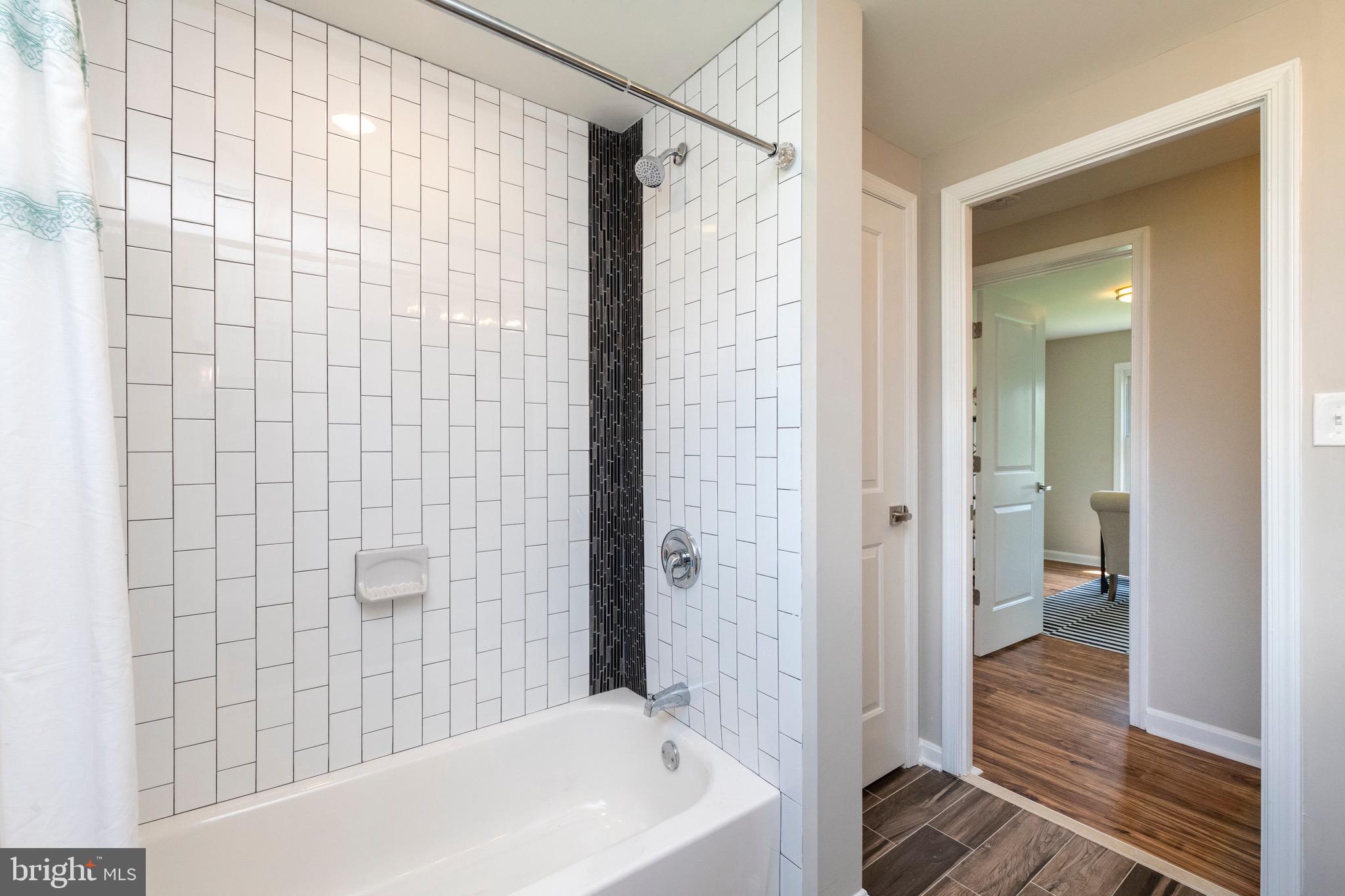 524 Patapsco Avenue Rosedale, MD 21237 - Photo 25 of 46 Custom Waterfall accent tile in Hall Bathroom!