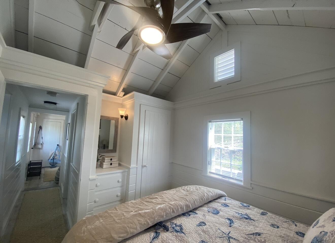 241 Old Wharf Road, Unit 162 Dennis Port, MA 02639 - Photo 14 of 28 a bedroom with a bed and a window