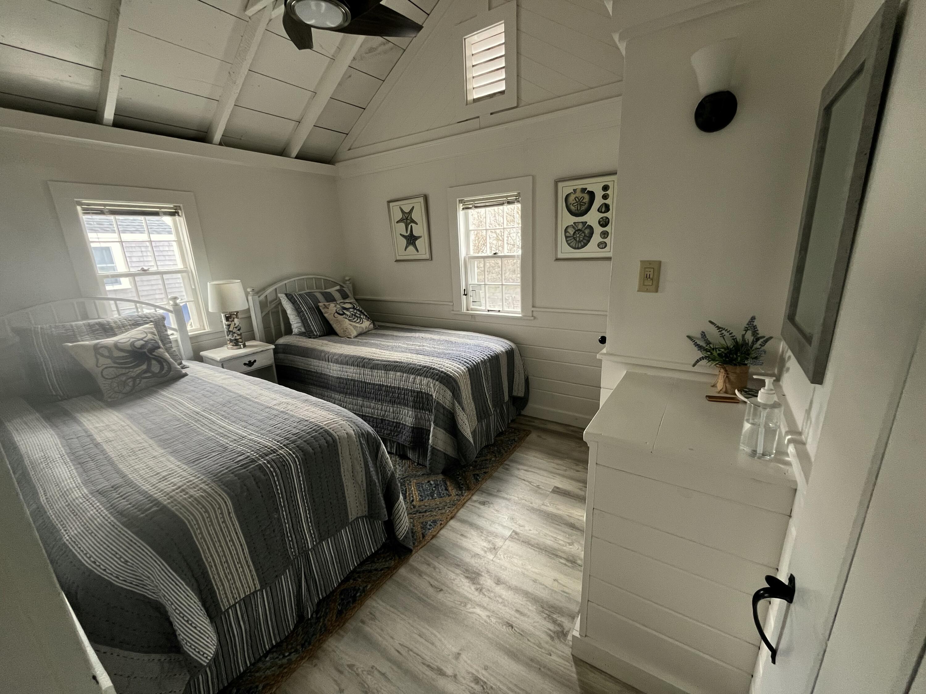 241 Old Wharf Road, Unit 162 Dennis Port, MA 02639 - Photo 18 of 28 a bedroom with double bed and a window