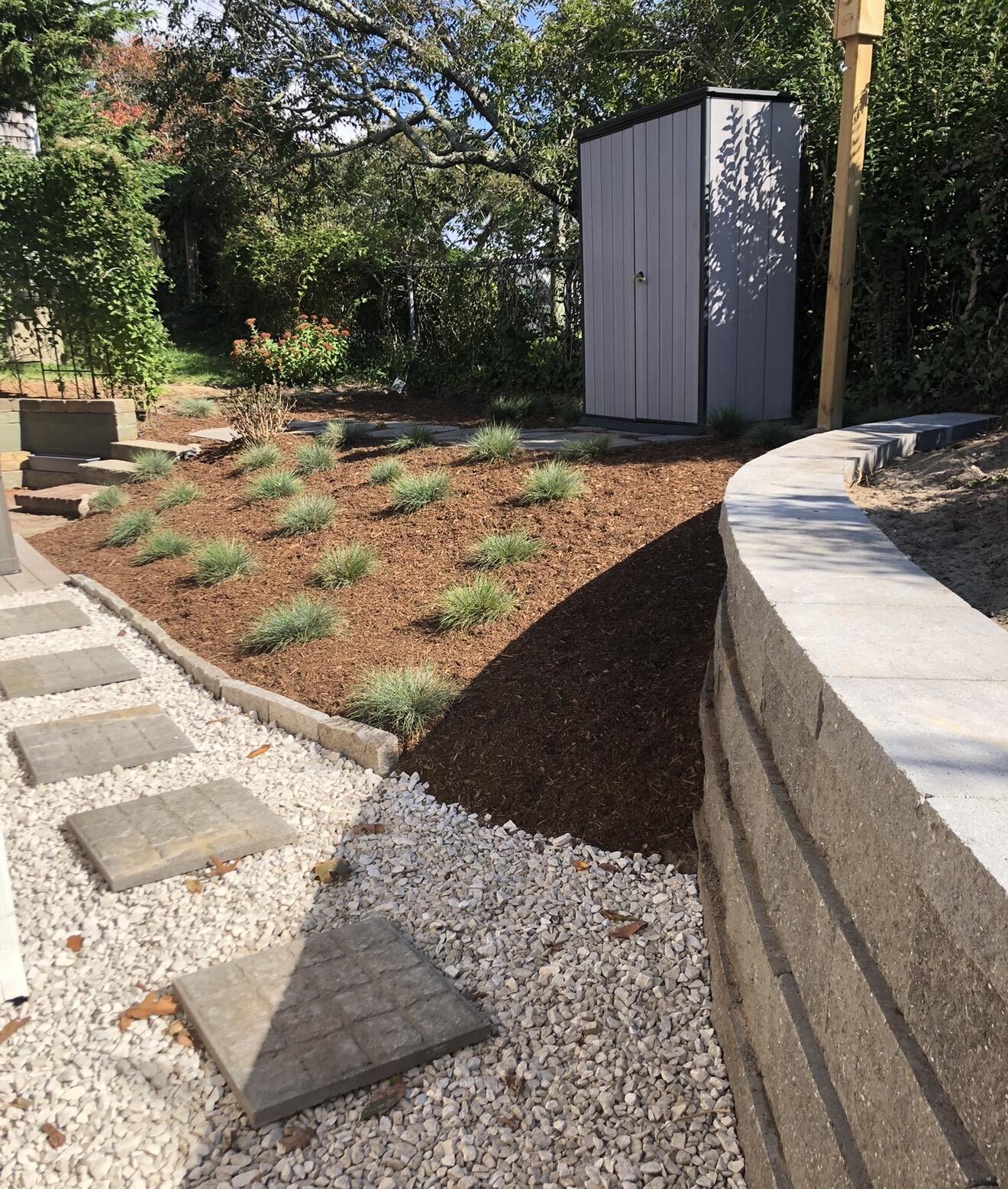 241 Old Wharf Road, Unit 162 Dennis Port, MA 02639 - Photo 22 of 28 a view of a backyard of the house