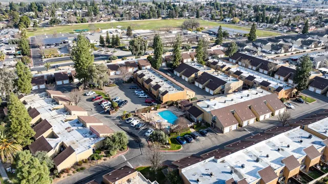 an aerial view of a city with lots of residential buildings