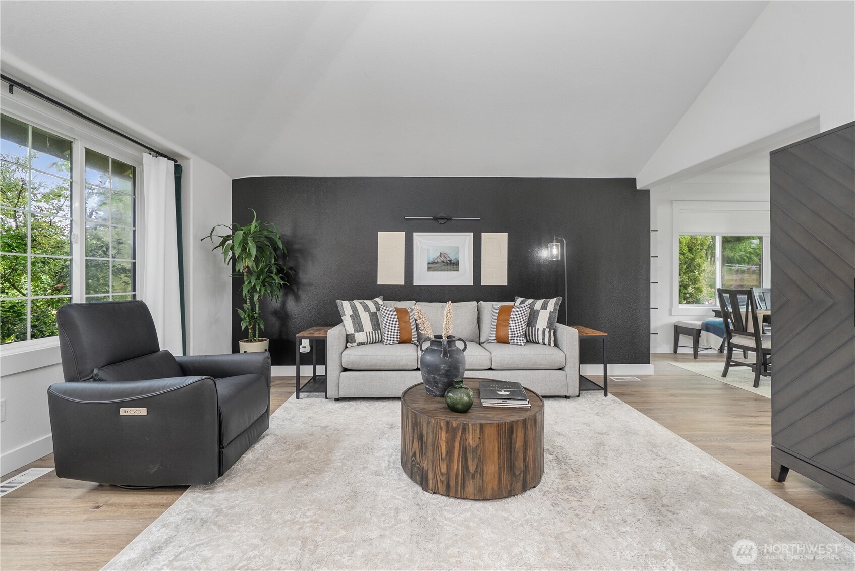 9906 328th Street East Graham, WA 98338 - Photo 23 of 38 a living room with furniture and a large window