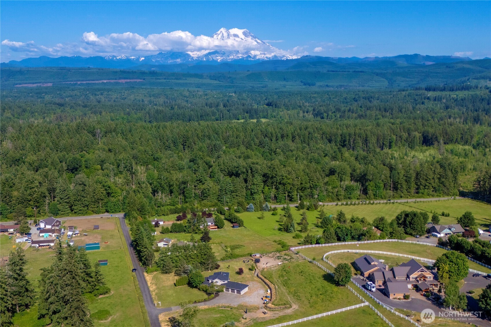 9906 328th Street East Graham, WA 98338 - Photo 36 of 38 a view of a street with a yard