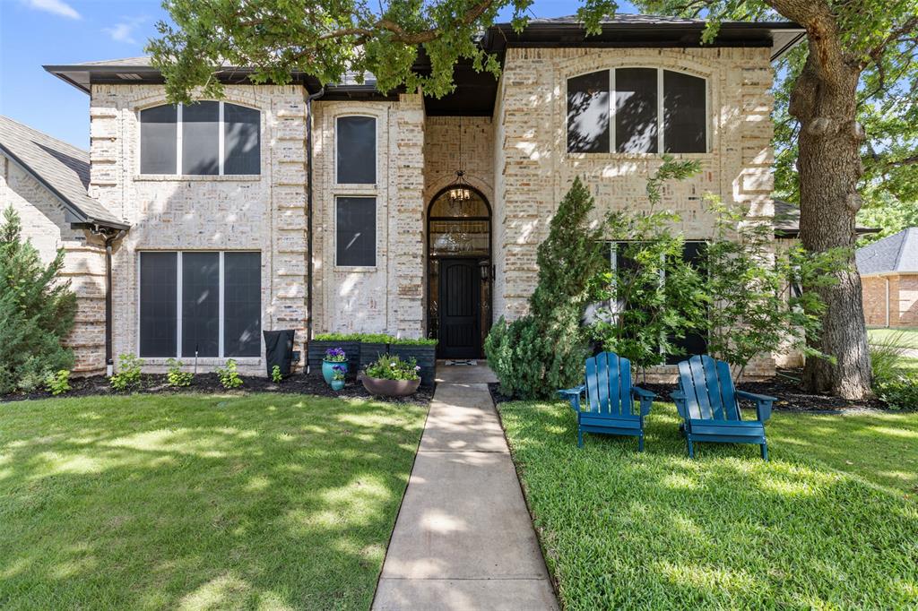 609 Seville Road Denton, TX 76205 - Photo 10 of 40 Stunning curb appeal to welcome you home! German Schmear brick exterior.