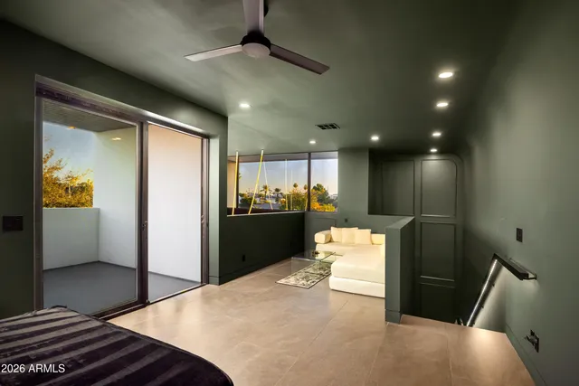 a outdoor space with lots of tables a garden and chairs