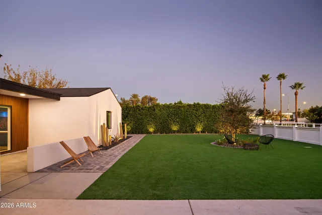 a garden view with a sitting space
