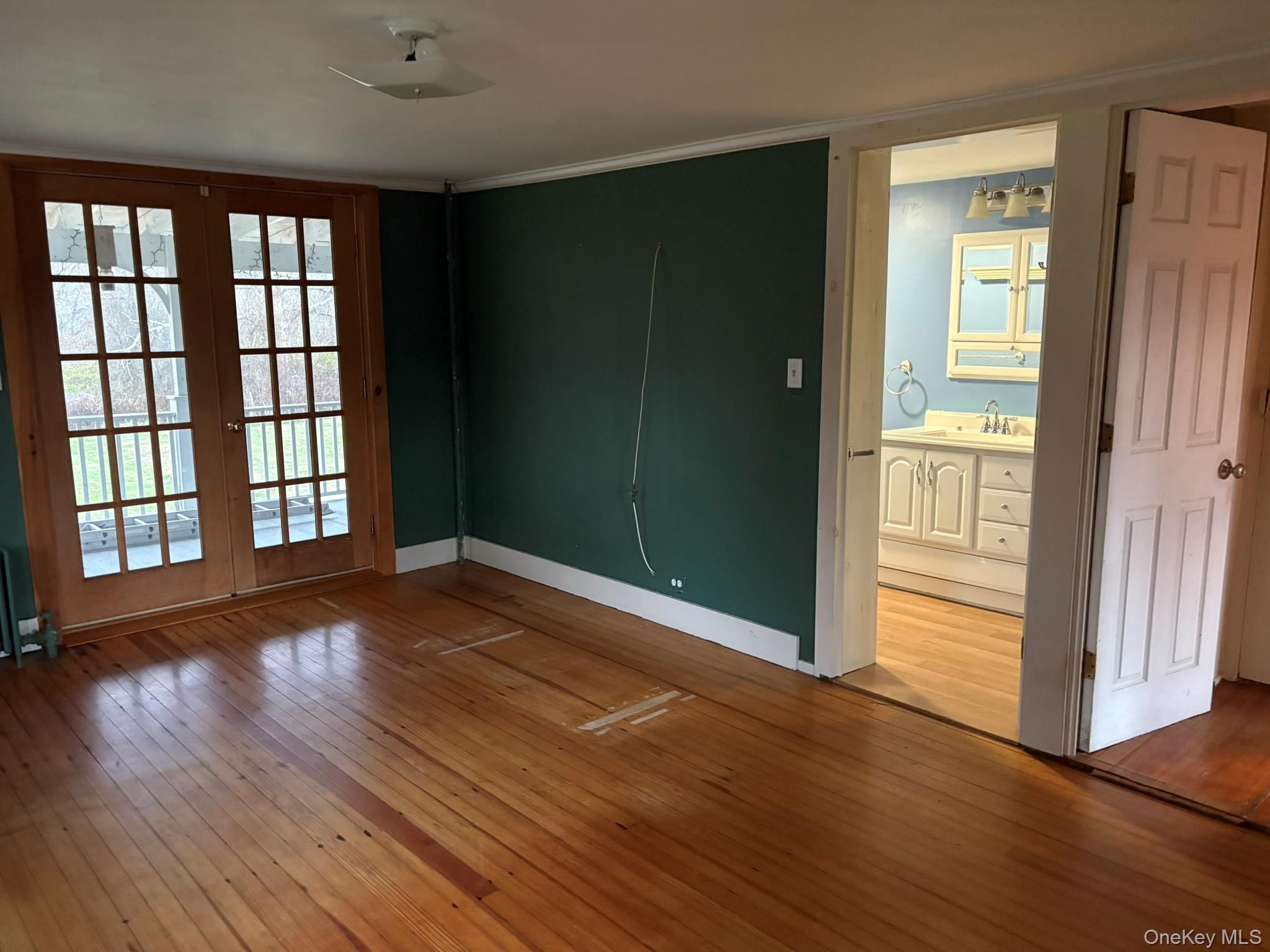 15 Sharon Valley Road Sharon, CT 06069 - Photo 13 of 26 an empty room with wooden floor and windows