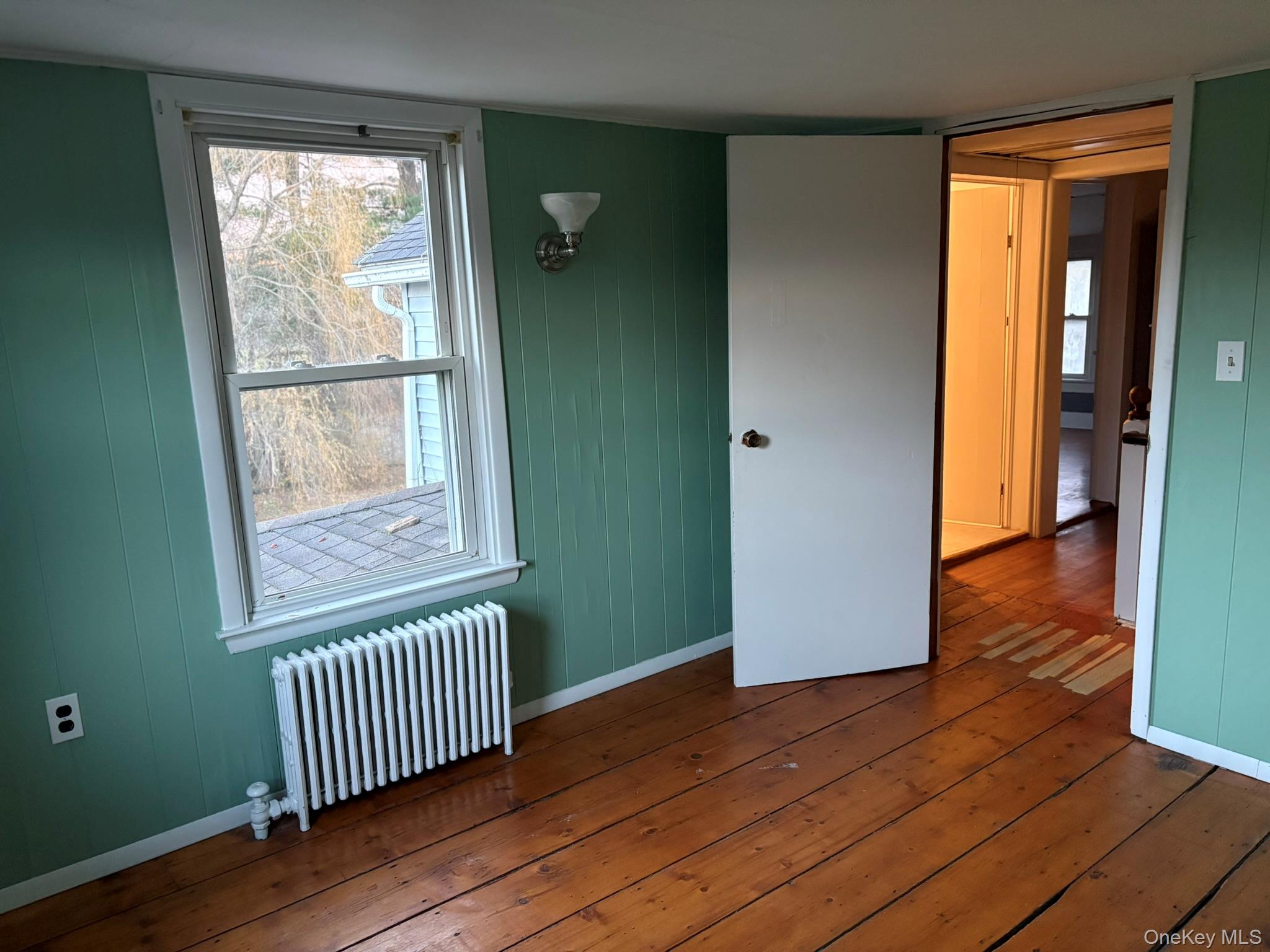 15 Sharon Valley Road Sharon, CT 06069 - Photo 17 of 26 wooden floor and windows in an empty room