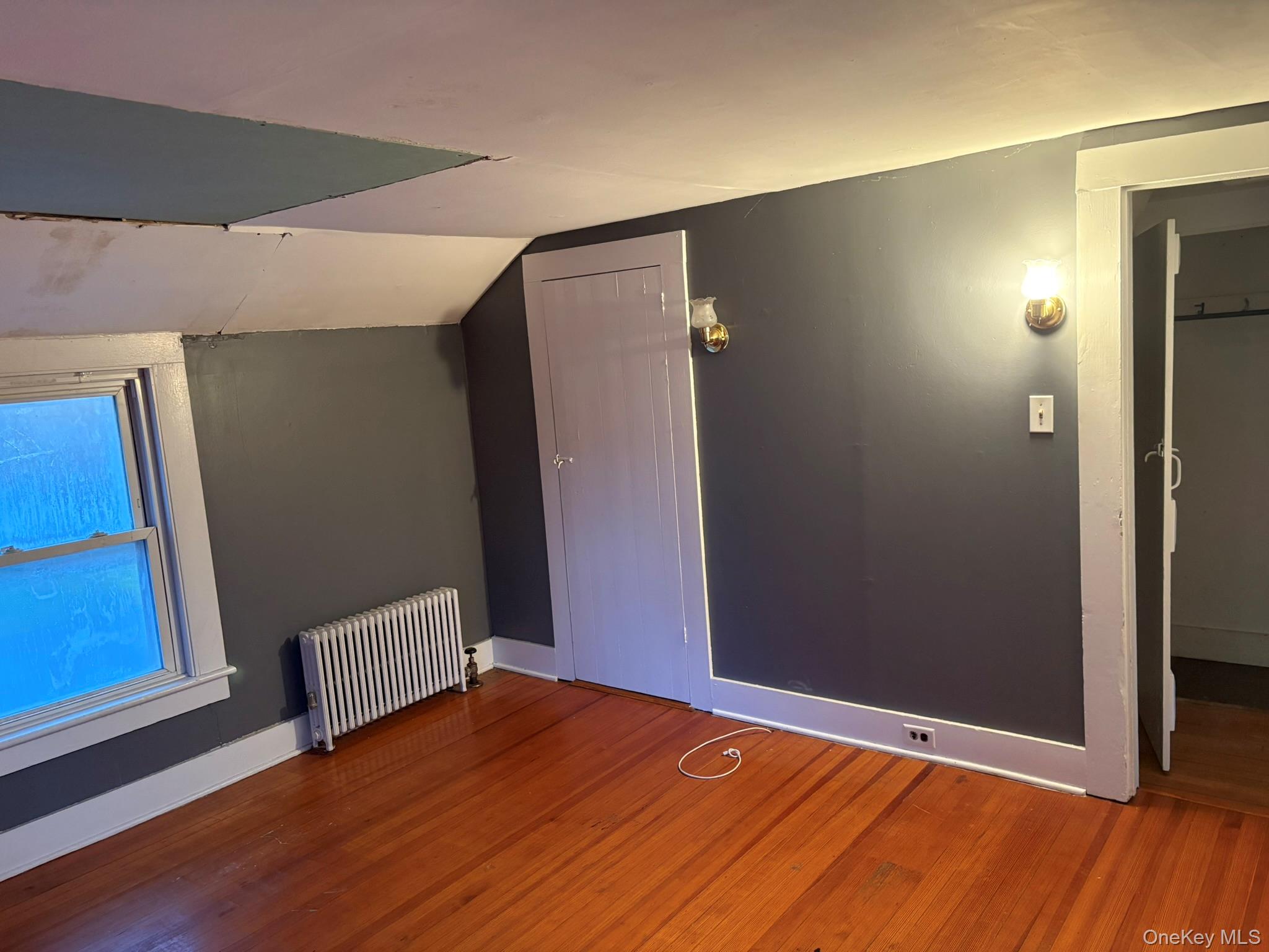 15 Sharon Valley Road Sharon, CT 06069 - Photo 18 of 26 an empty room with wooden floor and closet