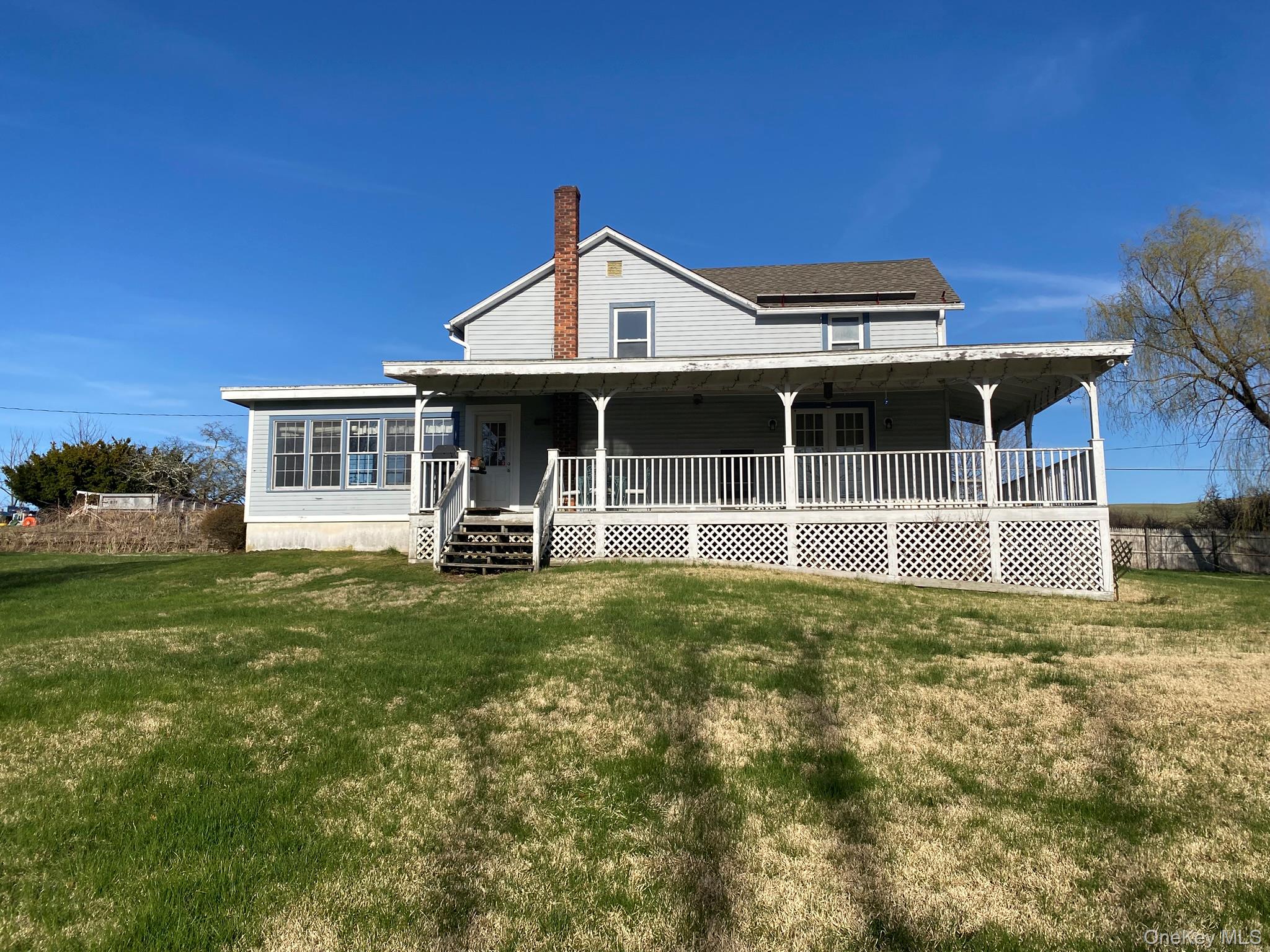 15 Sharon Valley Road Sharon, CT 06069 - Photo 2 of 26 a view of a house with backyard and porch