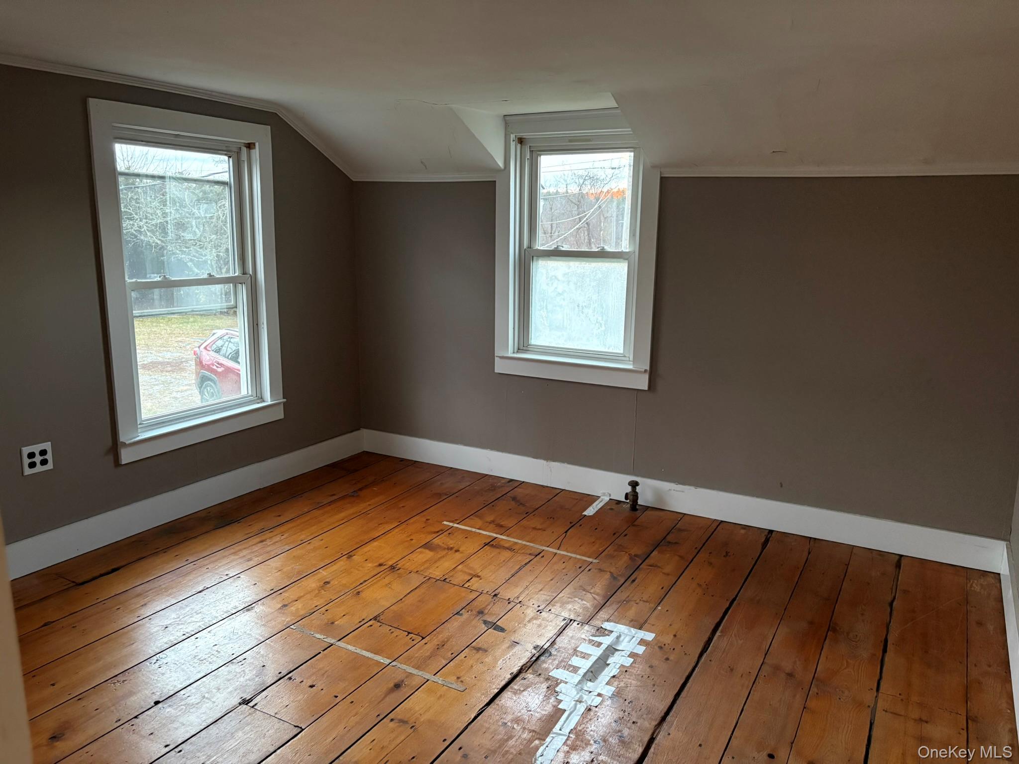 15 Sharon Valley Road Sharon, CT 06069 - Photo 22 of 26 a view of an empty room with wooden floor and a window
