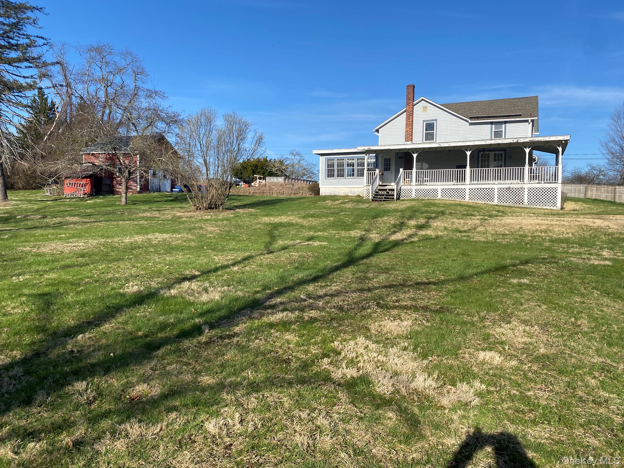 15 Sharon Valley Road Sharon, CT 06069 - Photo 3 of 26 a front view of a house with a yard