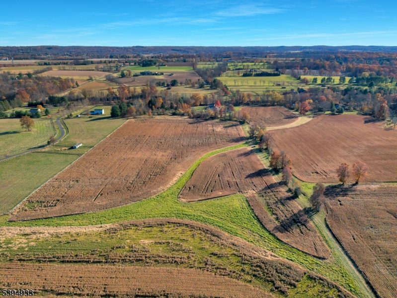58 Dunkard Church Road Stockton, NJ 08559 - Photo 15 of 26 an aerial view of a house with a yard lake view and mountain view