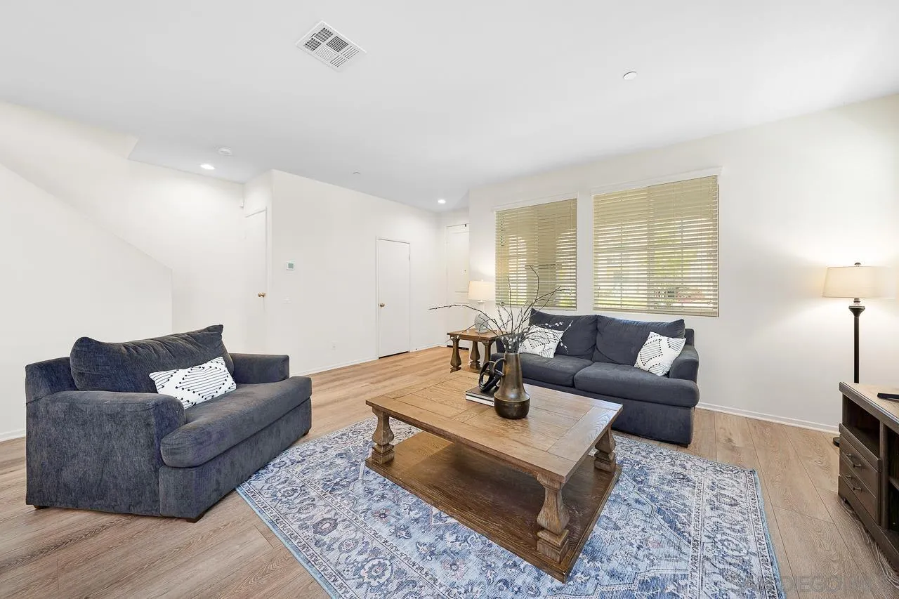 1290 Santa Victoria Road, Unit 2 Chula Vista, CA 91913 - Photo 15 of 41 a living room with furniture and a couch
