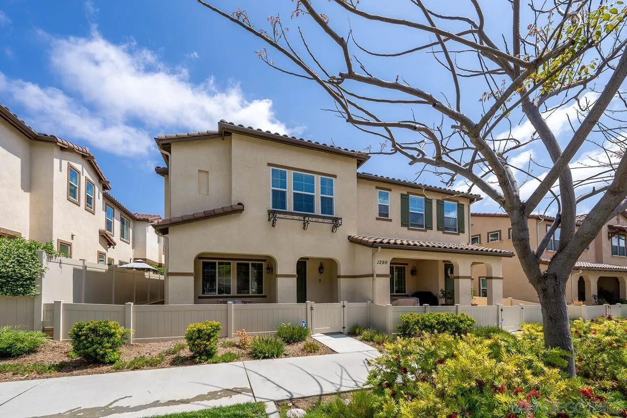 1290 Santa Victoria Road, Unit 2 Chula Vista, CA 91913 - Photo 2 of 41 a front view of a house with garden