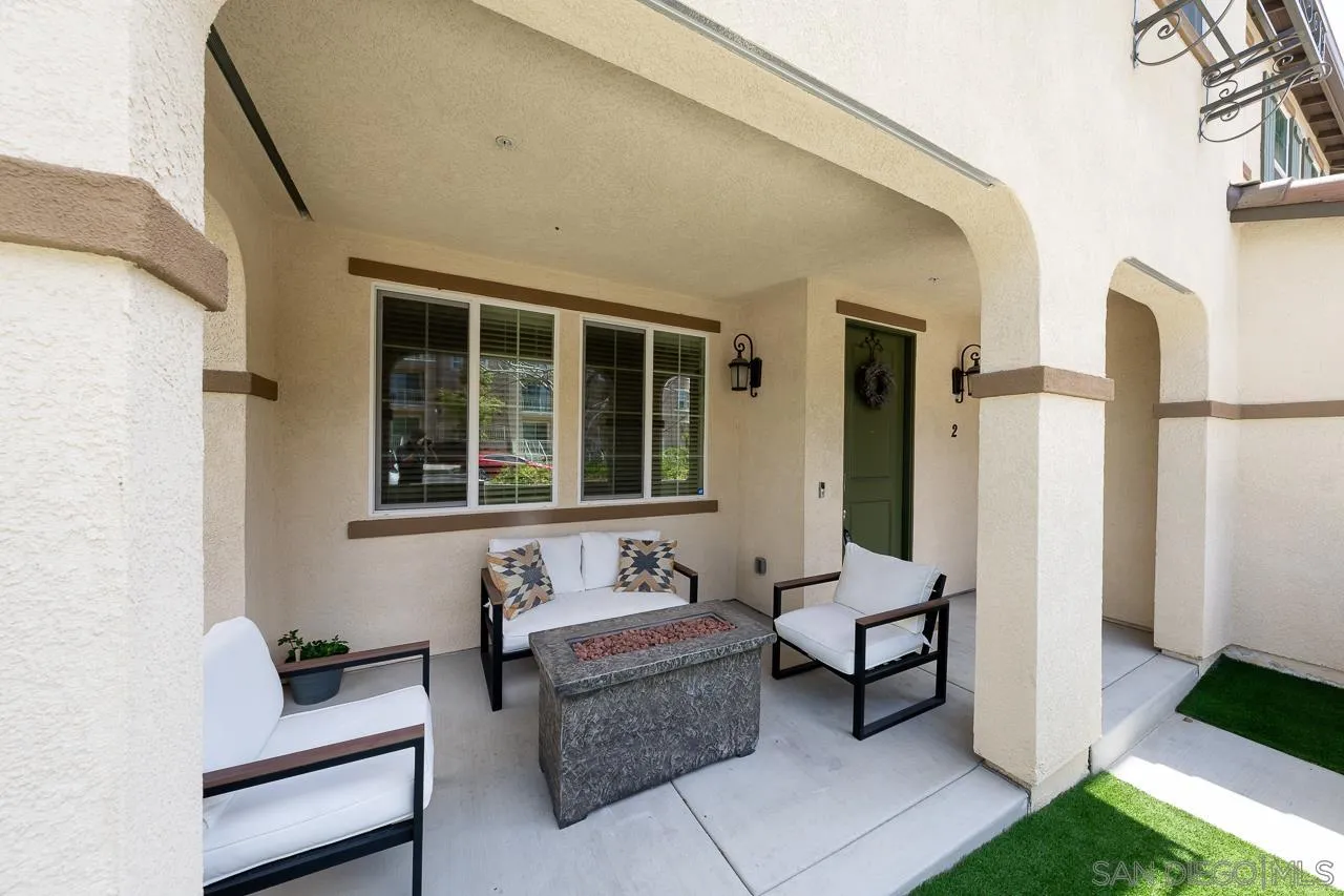 1290 Santa Victoria Road, Unit 2 Chula Vista, CA 91913 - Photo 3 of 41 a living room with furniture and a window