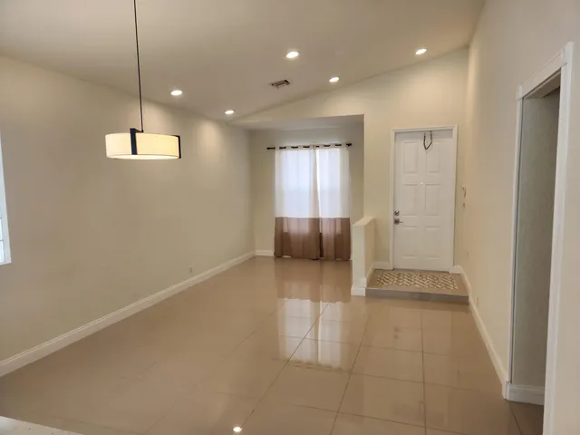a view of a livingroom with a staircase