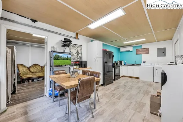 a living room with furniture and a table