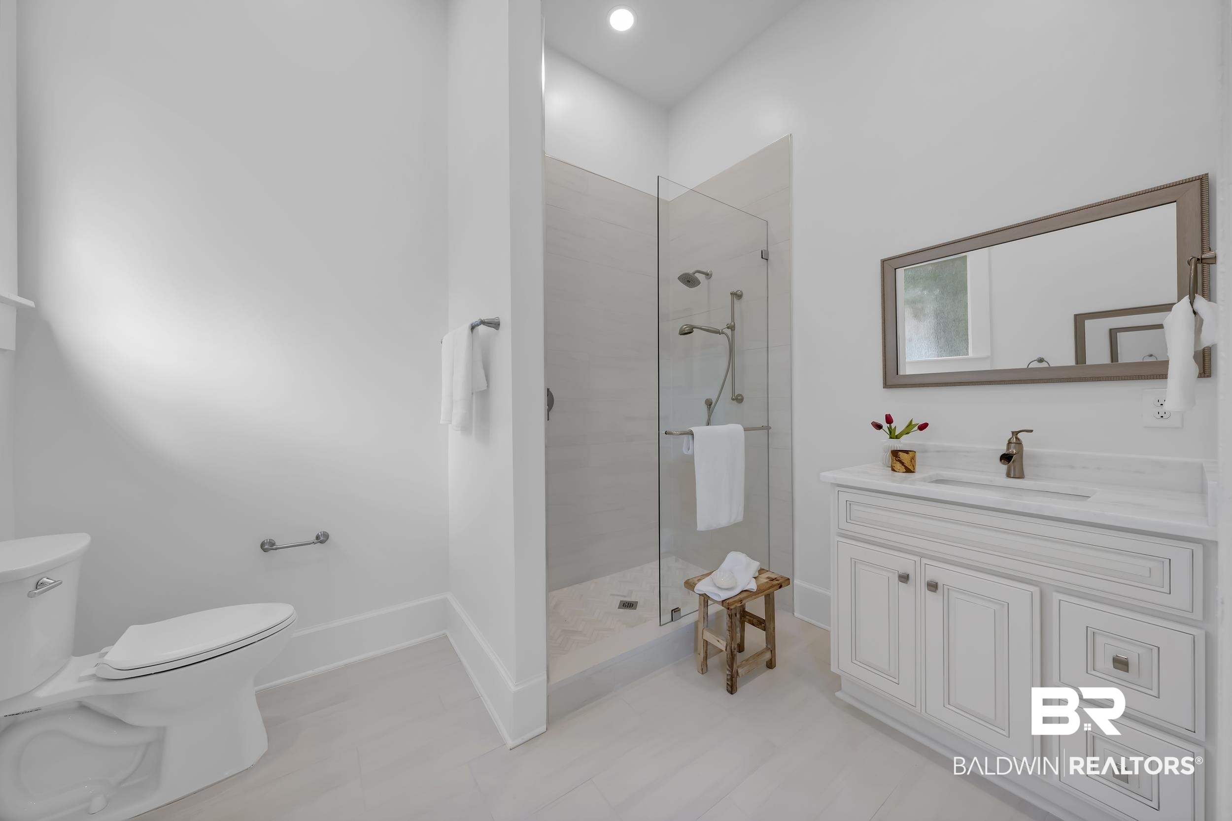 1662 Government Street Mobile, AL 36604 - Photo 22 of 33 Full bath with vanity, a walk in shower, and light tile patterned floors